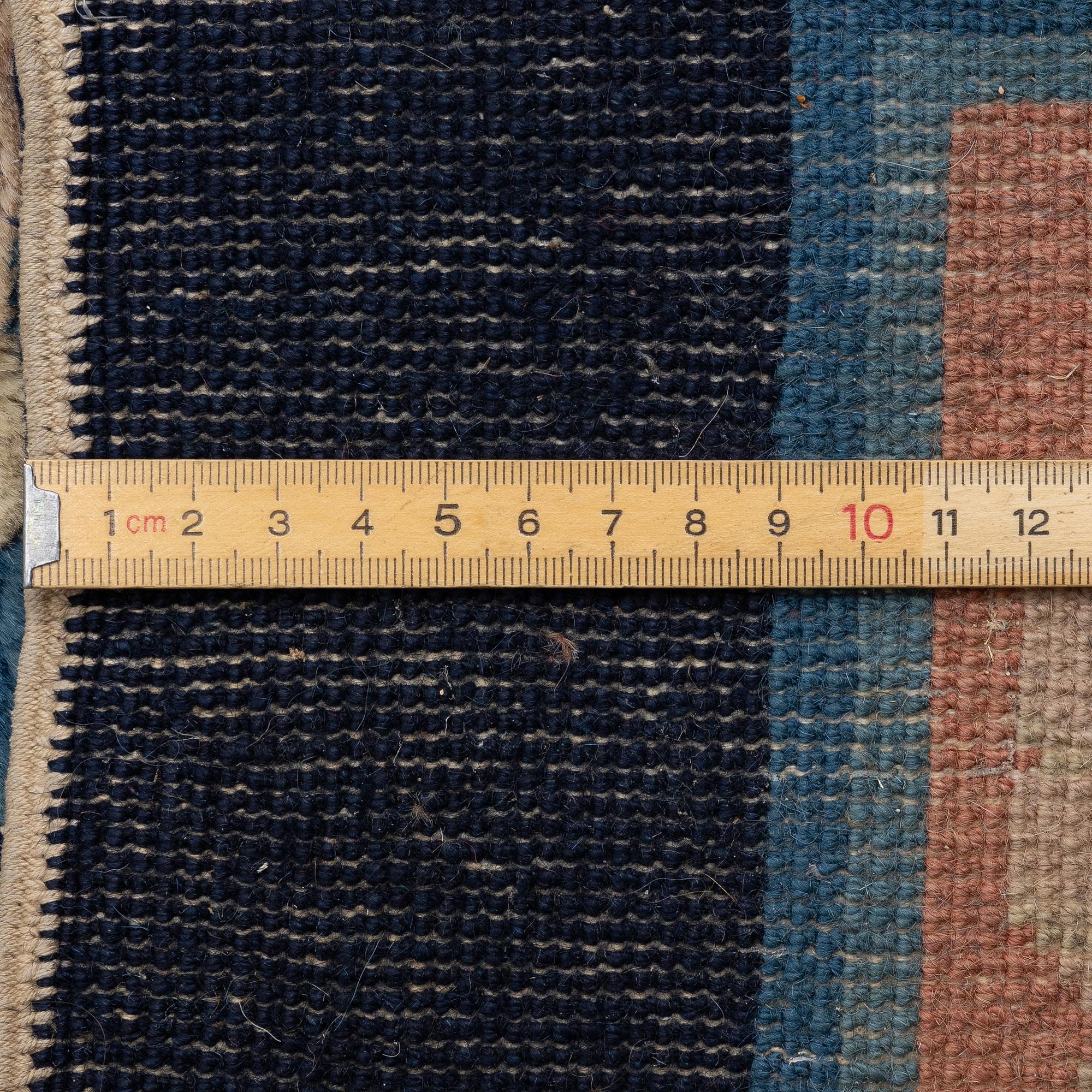 A carpet, China, c. 488 x 343 cm.