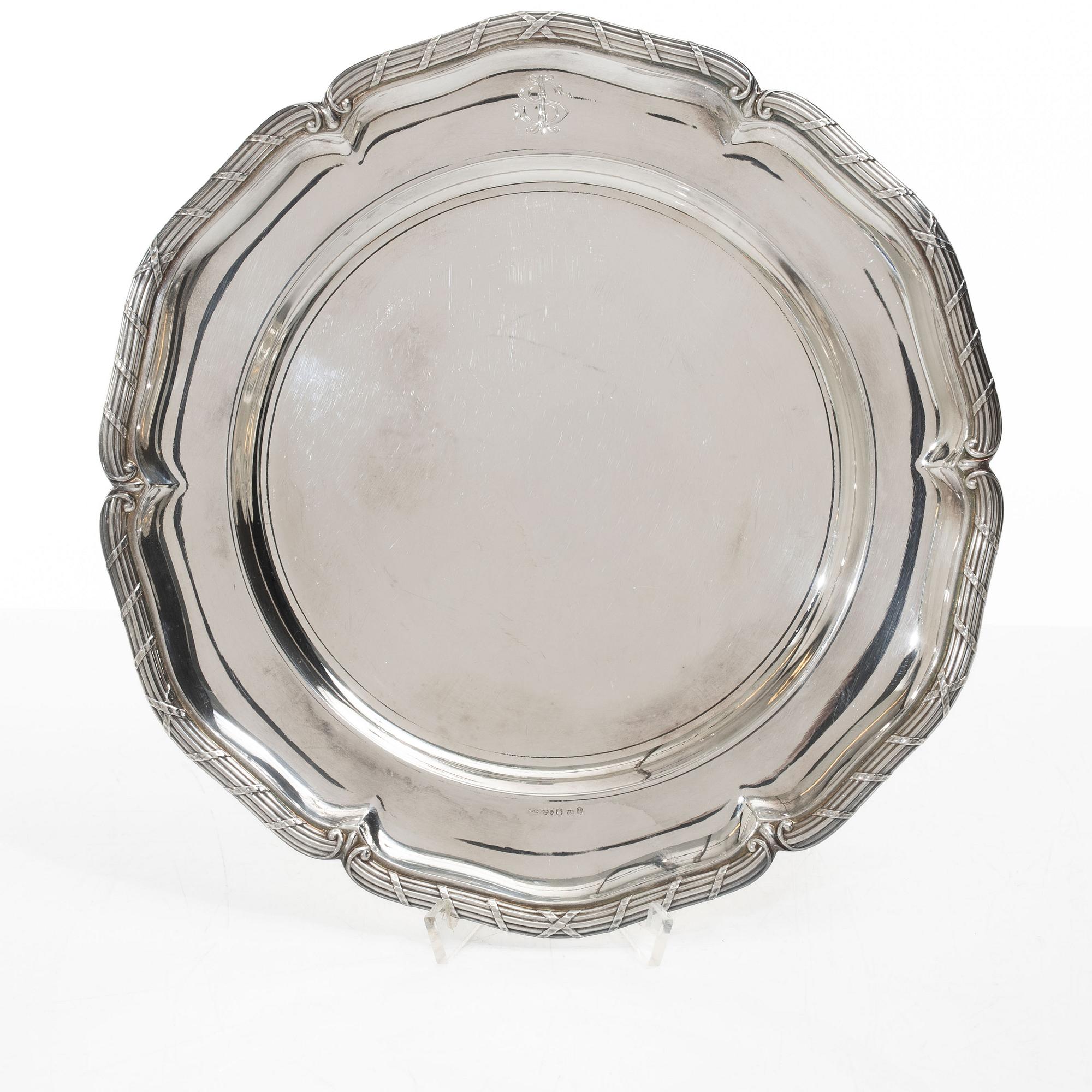 A set of seven silver plates (6+1), including GAB, Stockholm 1943.