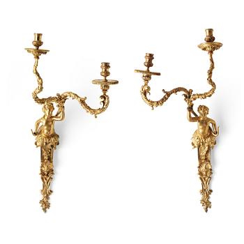 579. A pair of French Régence early 18th century two-light wall-lights.