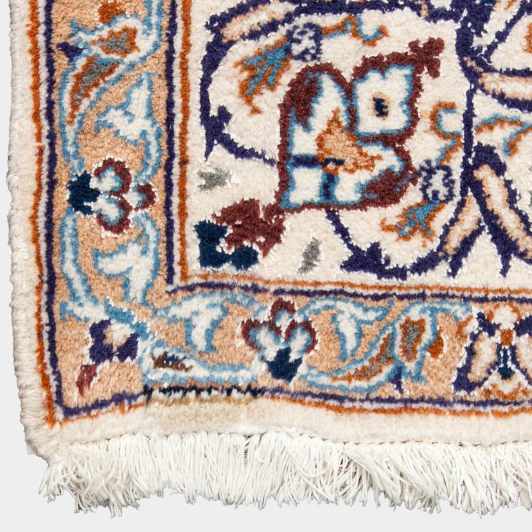 A carpet, Nain, part silk, ca. 295 x 201 cm.