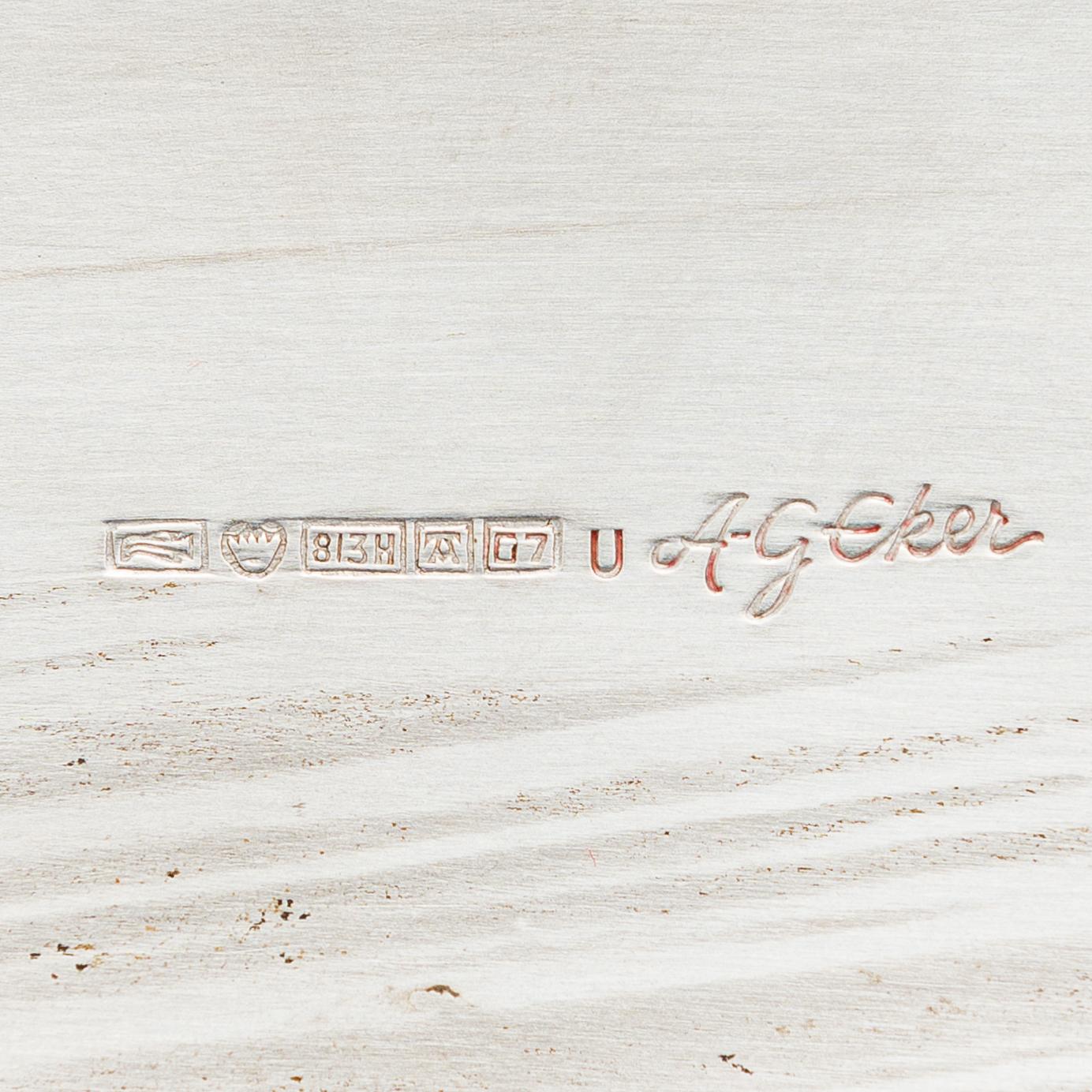 Anna-Greta Eker, A mahogany and silver sugar bowl and cream jug and a silver bowl, Auran Kultaseppä, Turku 1963-67.