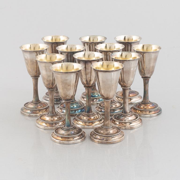 Karl-Axel Karlsson Silversmed, twelve sterling silver cups, Stockholm 1975-85.