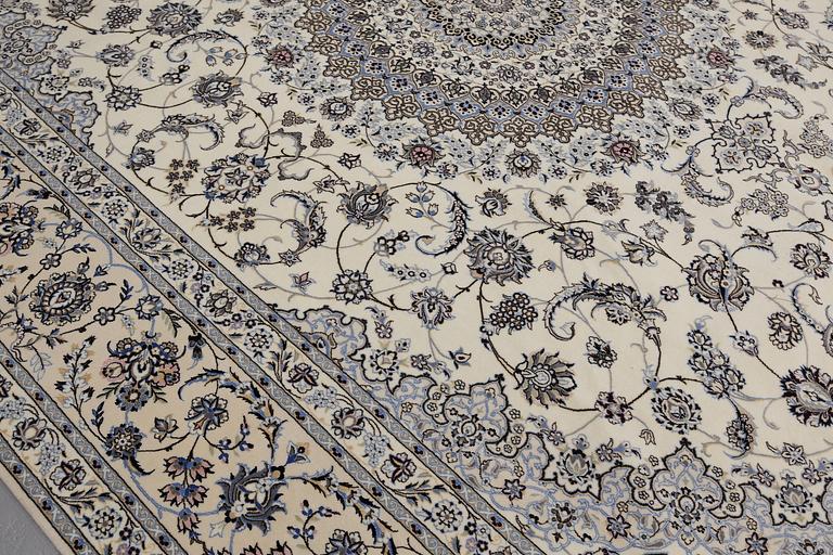 A Nain part silk carpet, 408 x 308 cm.