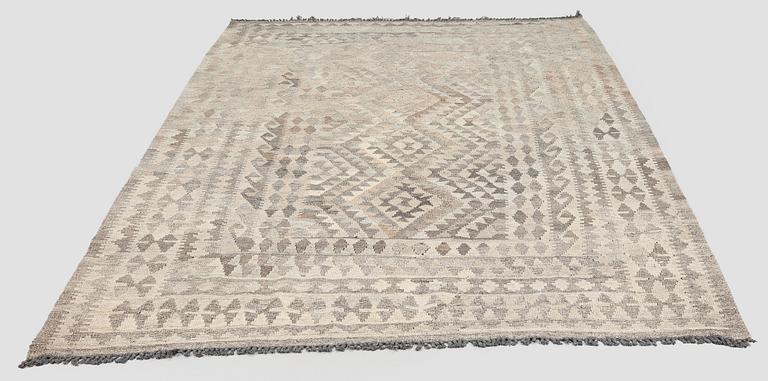 A Kilim carpet, ca. 262 x 176 cm.