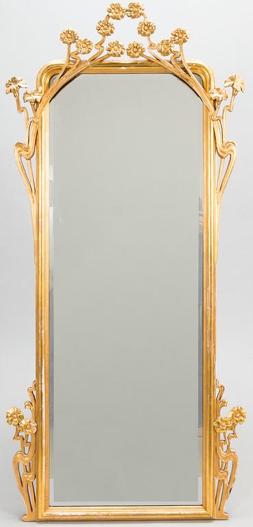 An Art Nouveau mirror with console table from early 20th century.