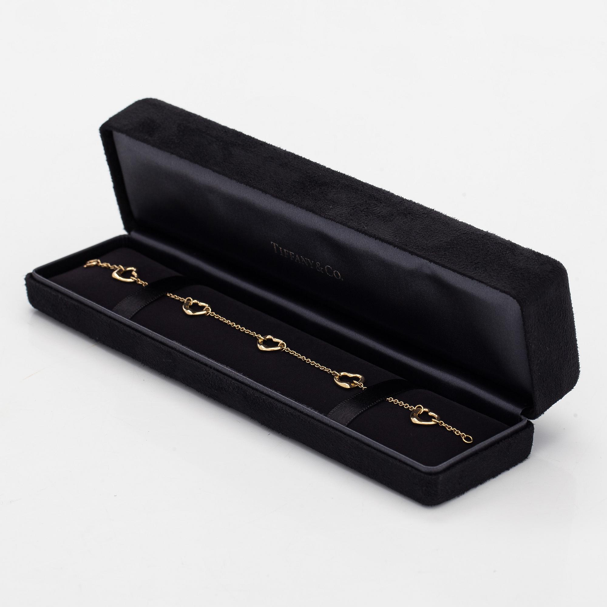 Tiffany & Co, Elsa Peretti, an 18K gold 'Open Heart' bracelet.