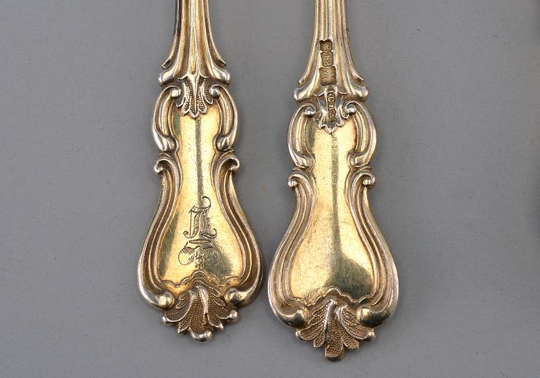 A SET OF CUTLERY, 84 silver, gilt. Carl Magnus Ståhle, St Petersburg 1848. Weight 211 g.