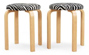 5. A pair of Alvar Aalto stools for Artek, Finland 2002.