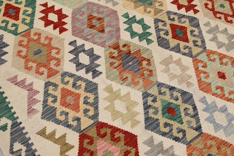 A Kilim carpet, approx. 293 x 254 cm.