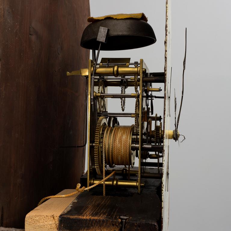 A first half of the 19th century mahogany long case clock.