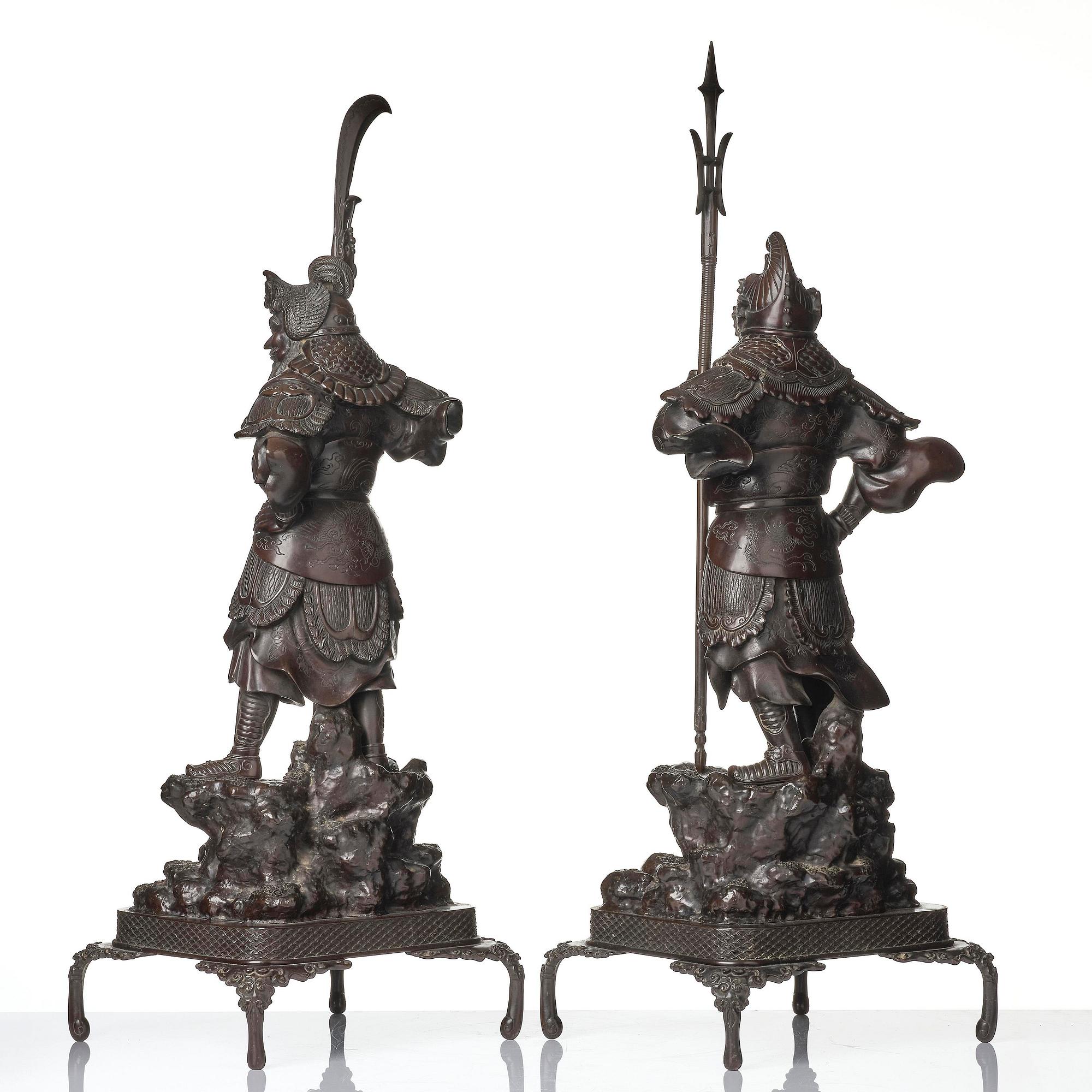 A pair of Japanese bronze guardians, Meiji period (1868-1912).