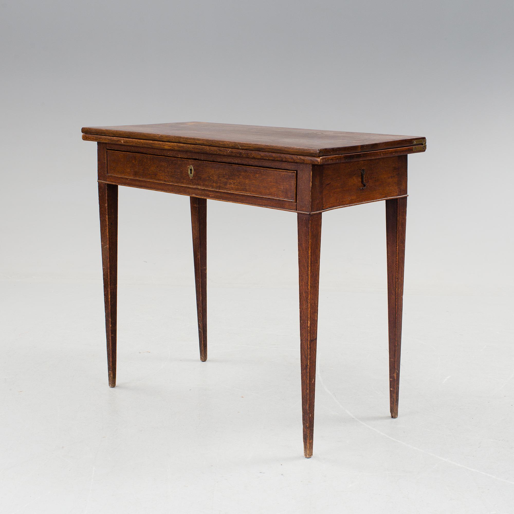 A late gustavian table by Jonas Lidströmer. Signed and dated 1779.