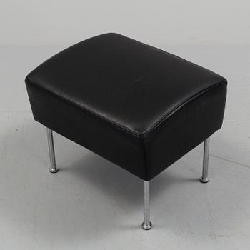 A "Cinema" footstool by Gunilla Allard.
