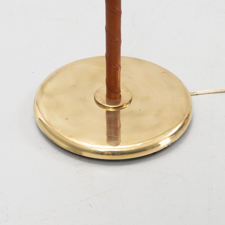 A mid 20th Century double headed floor lamp.