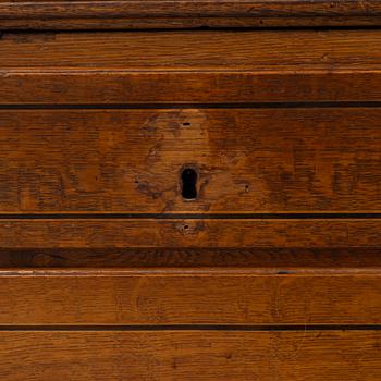 An oak secretaire, first half of the 19th century.