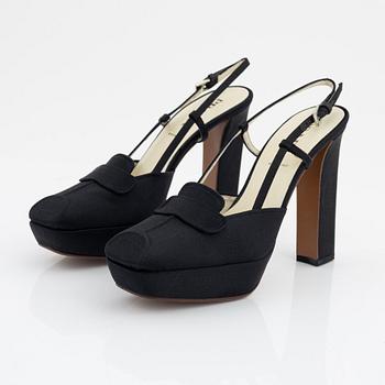 Prada, a pair of black silk pumps, size 36 1/2.