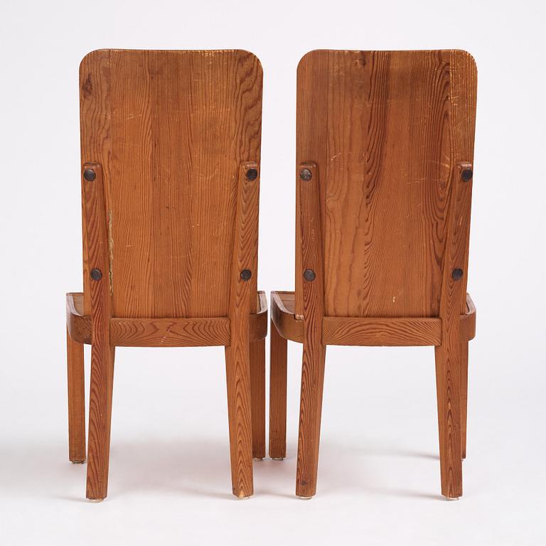 Axel Einar Hjorth, a pair of stained pine 'Lovö' chairs, Nordiska Kompaniet, Sweden 1930s.