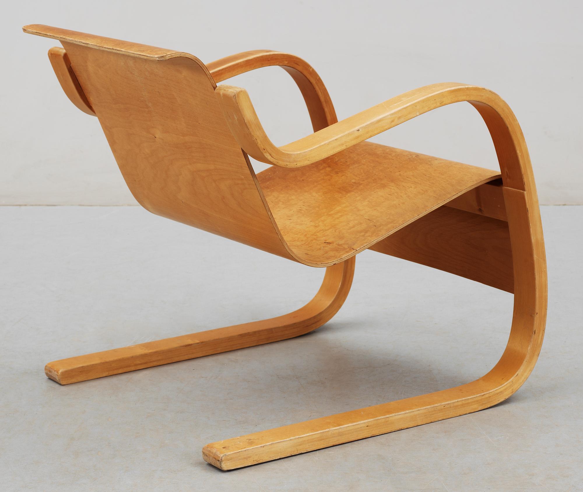 An Alvar Aalto birch armchair by O.y Huonekalu-ja Rakennustyötehdas A.B,