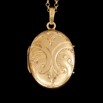 MEDALJONG med KEDJA 18 k guld. Vikt tot 12,8 g.
