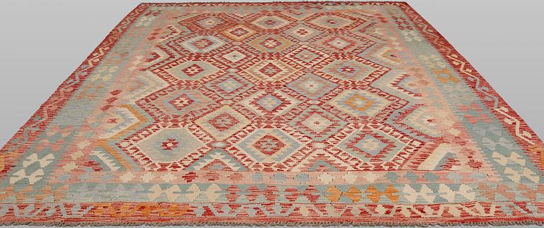 A Kilim carpet, approx. 338 x 265 cm.