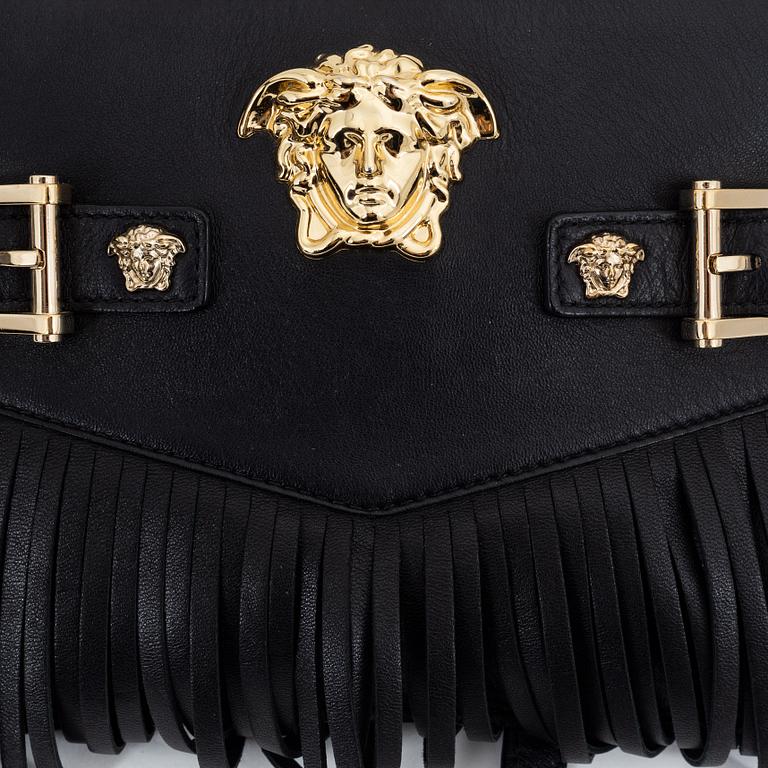 Versace, a handbag.