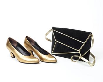An evening bag and a pair of lady shoes by Charles Jourdan.