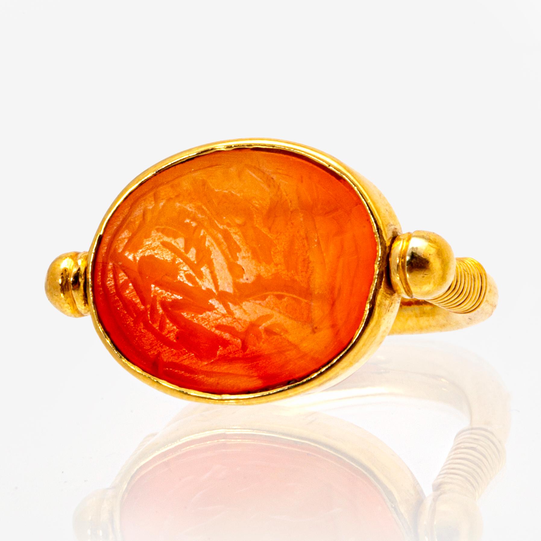 Ring and pendant, 18k and 14K (pendant), carnelian inscribed.