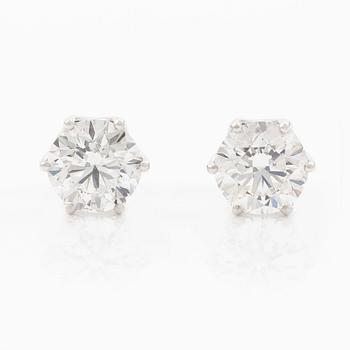 Earrings, single-stone earrings in 18K white gold with brilliant-cut diamonds, accompanied by IGI report.