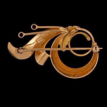 BROSCH, 18k guld med fasettslipad bergskristall, importstämplad, omkring 1900-talets mitt. Vikt 5 g.