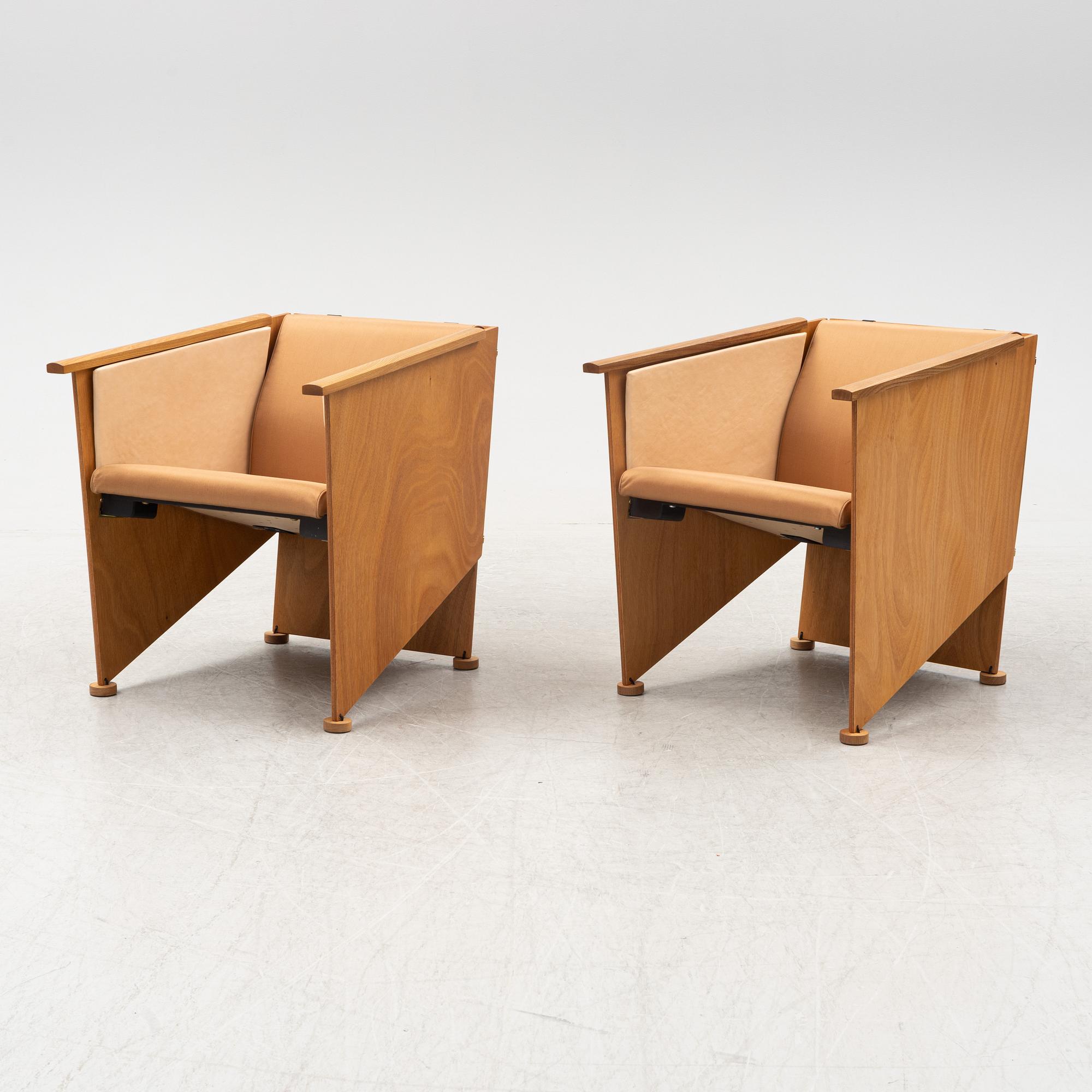 Torbjörn Ahlström, a pair of elm and cherry armchairs.