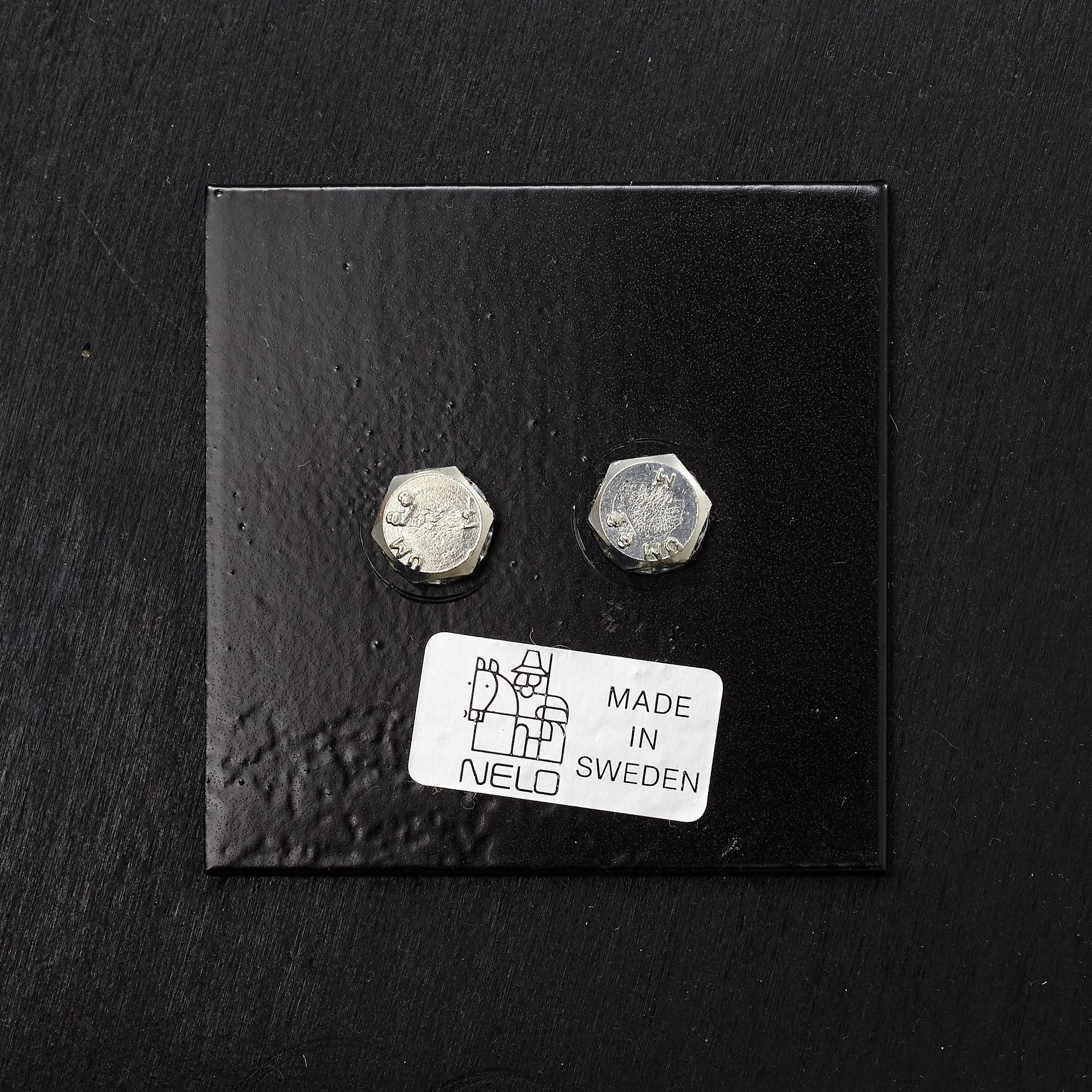 Takashi Okamura & Erik Marquardsen, a "Wave" armchair with ottoman, Nelo, 1970's.