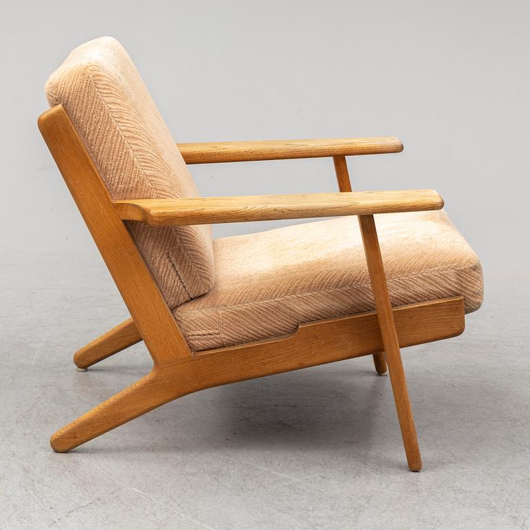 HANS J WEGNER, an oak 'GE-290' easy chair from Getama, Denmark.