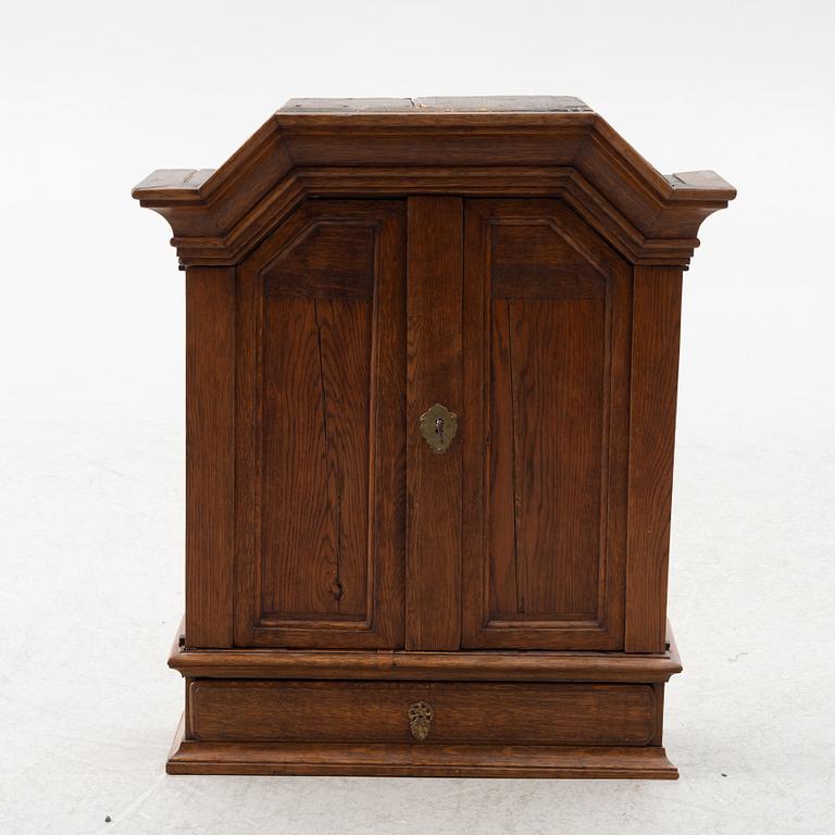 A wall cabinet, 18th century.