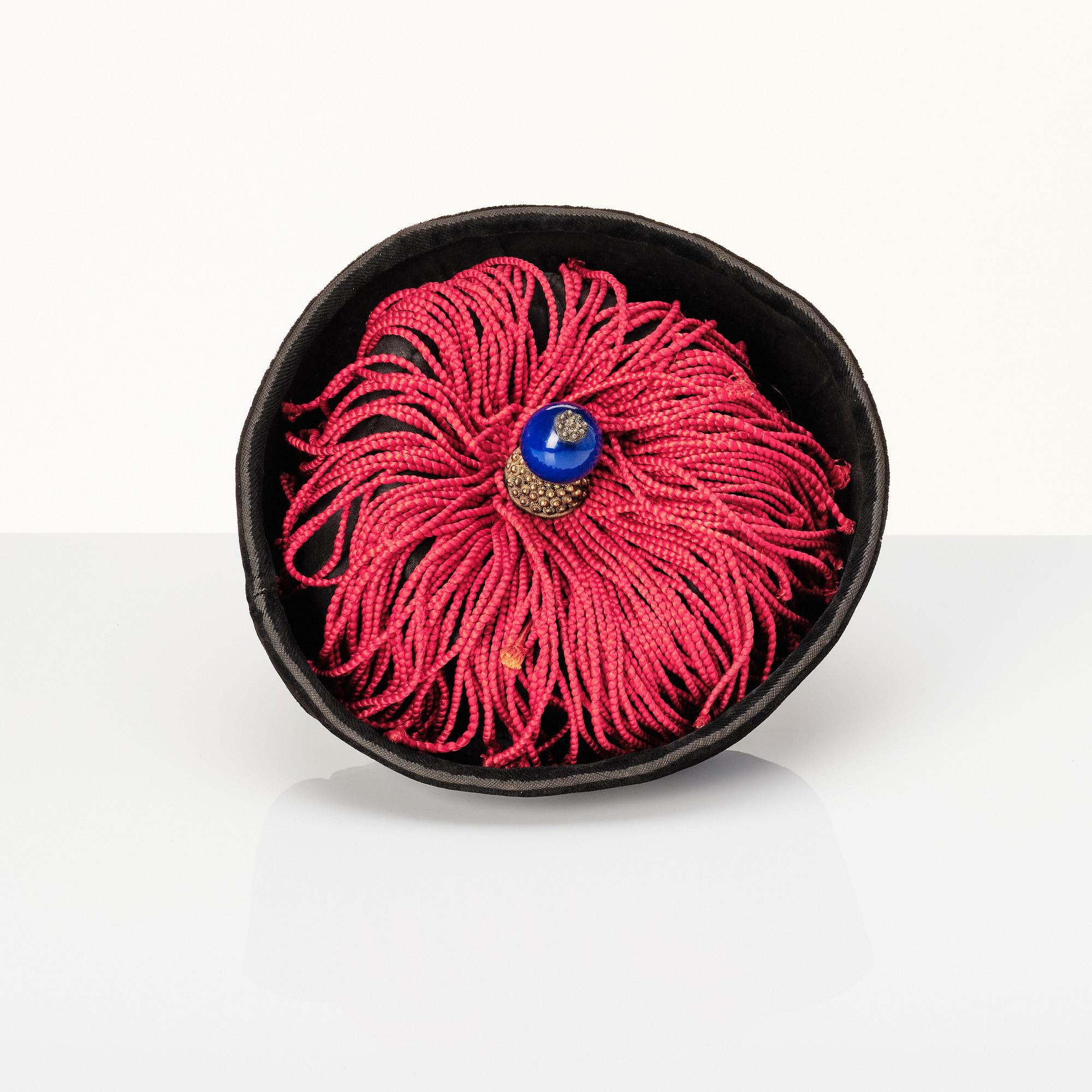 A Manchu Official's Winter Hat 'jiguan' with rank finial, late Qing dynasty.