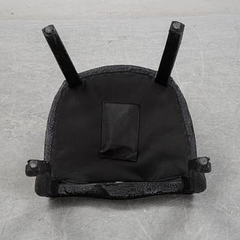 Maarten Baas, a promotional "Smoke dining chair" for Moooi,  after 2002.