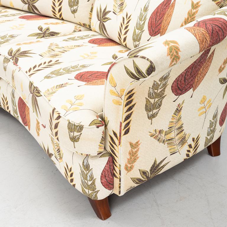 A curved sofa from Bröderna Andersson.