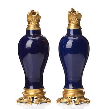 A pair of gilt bronze mounted vases, Qing dynasty, Qianlong (1736-95). French bronze mounts.