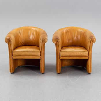 A pair of leather lounge chairs from Futura, Italy, late 20th Century.