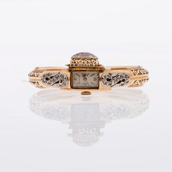 ARMBAND / ARMBANDSUR, 18K guld, åttkantslipade diamanter.