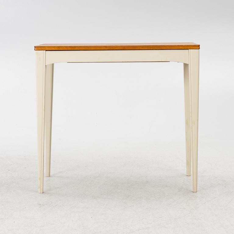 A dining table, mid-20th century.