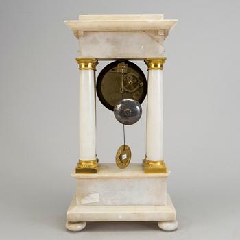 AN ALABASTER AND GILT BRASS TABLE CLOCK, mid 19th century.