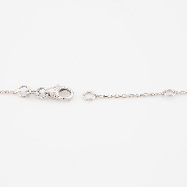 Necklace, 18K white gold heart-shaped with princess cut and pear-shaped diamonds.