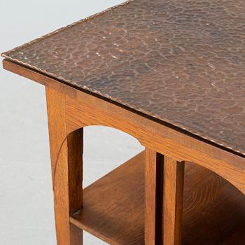 CARL CHRISTIAN CHRISTENSEN, a jugend smoking table, signed and dated 1910.