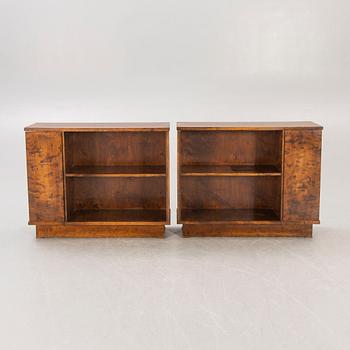 A pair of 1930s birch bookshelves.