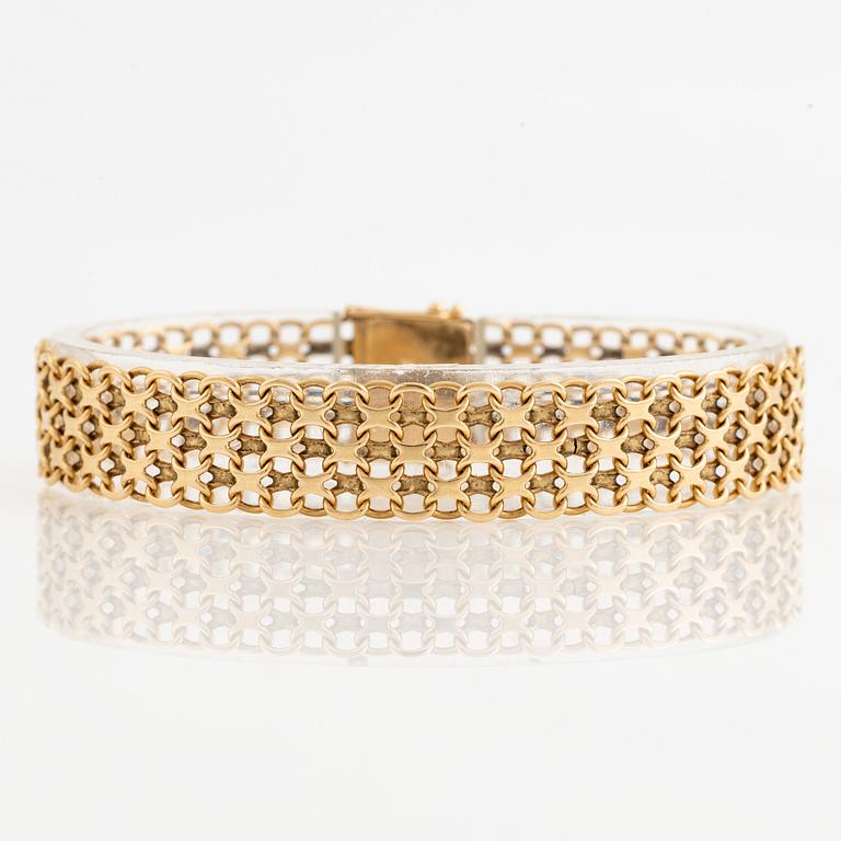 Arm bracelet, 18K gold, x-link.