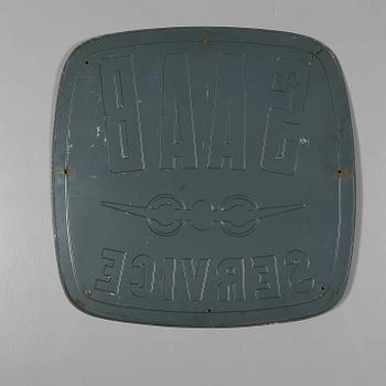 REKLAMSKYLT, metall, 1900-talets andra hälft.