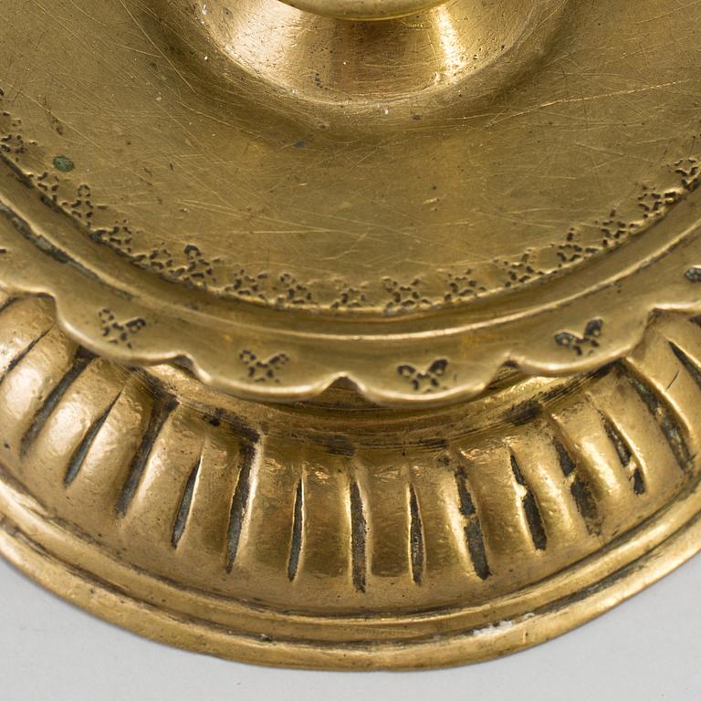 A 16th century bronze candlestick.