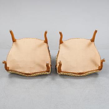 A pair of rococo style armchairs, early 20th Century.