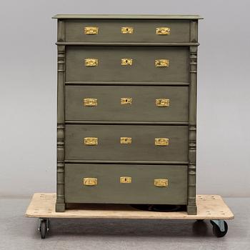 A painted chest of drawers, circa 1900.