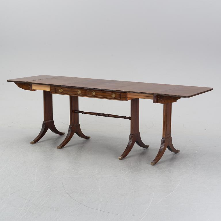 A mahogany dining table with folding and additional leaves, Nordiska Kompaniet, designed 1945.